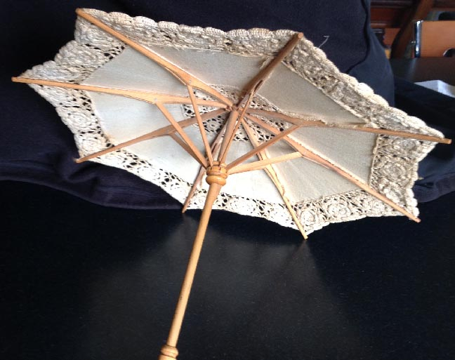 antique style dolls parasol with lace or crochet trim